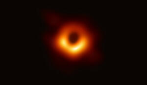 This ring-like structure with a dark central region shows the shadow of the event horizon of the supermassive black hole in galaxy M87.